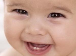 Серебряная ложка на первый зуб — миф или польза для ребёнка?